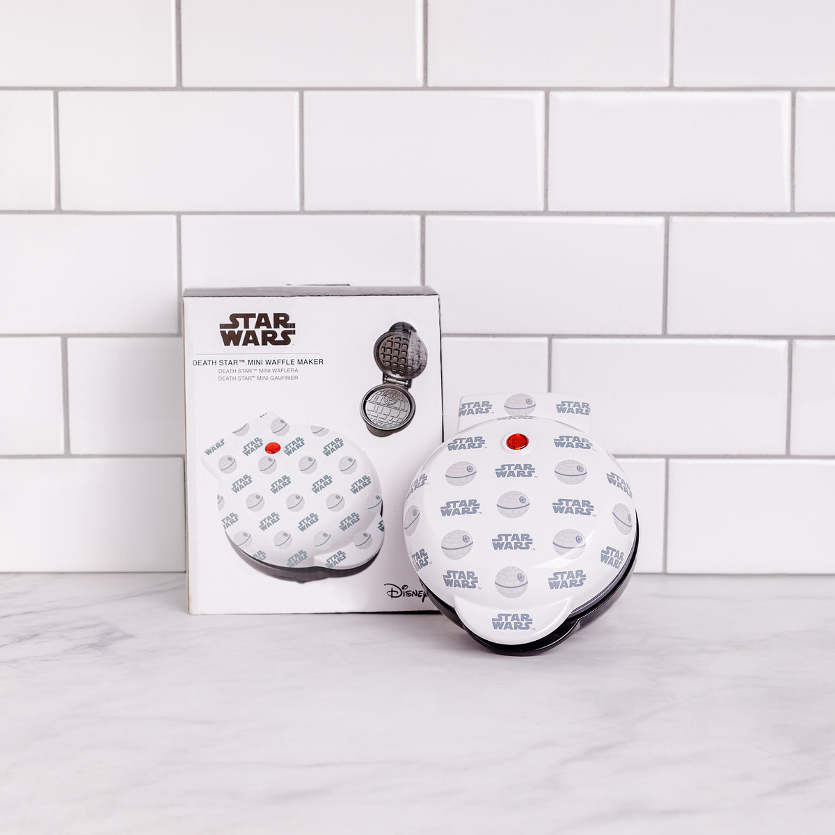 http://www.uncannybrandswholesale.com/cdn/shop/products/DeathStarMiniWaffleMaker6_2_1200x1200.jpg?v=1671570741